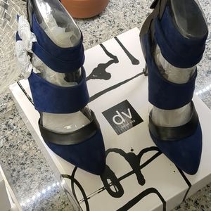 Brand new. Never worn. Dolce Vita oleander Navy and black suede heels size 7